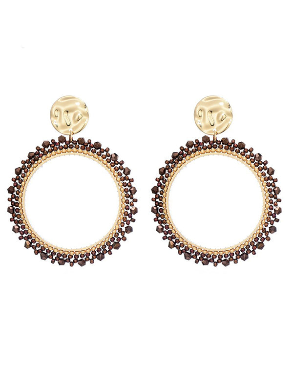 Goudkleurige oorbellen met roest kleurige miyuki beads