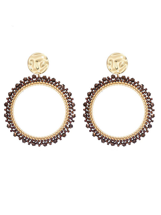 Goudkleurige oorbellen met roest kleurige miyuki beads