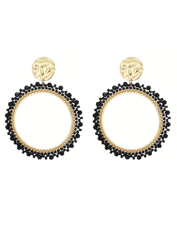 Goudkleurige oorbellen met zwarte miyuki beads