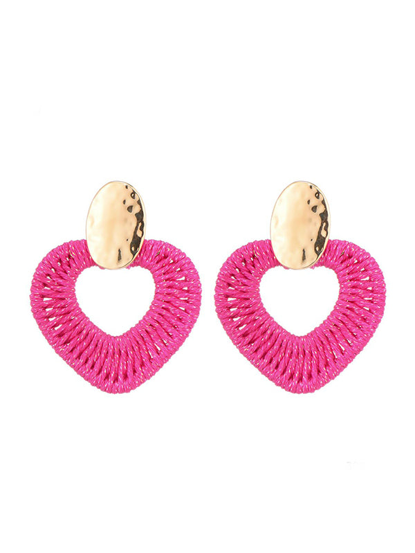 Statement oorbellen met fushia roze