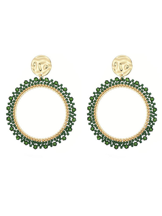 Oorbellen met groene miyuki beads