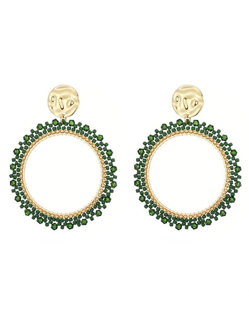 Oorbellen met groene miyuki beads