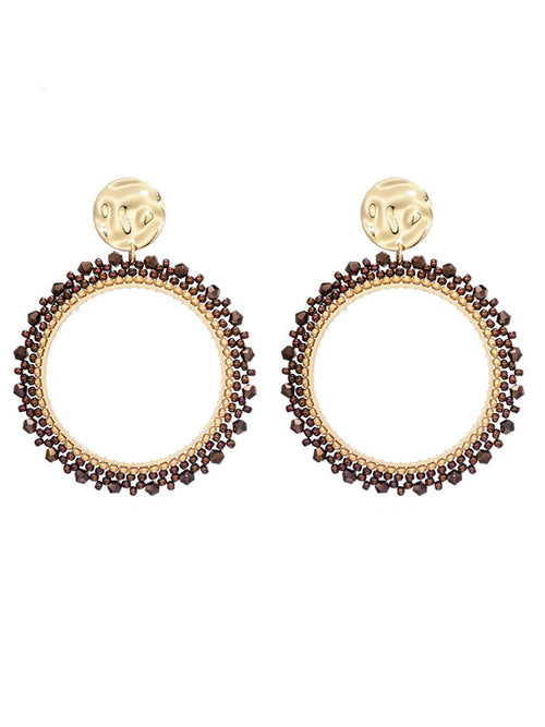 Goudkleurige oorbellen met roest kleurige miyuki beads